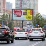 Вернадского  проспект, пересечение с улицей Крупской, добавочная разделительная полоса    супермаркет «Магнолия», аптека «ГорЗдрав», офис МГТС,  колеровочная студия «Dulux», немецкий мультимаркет света, билборд 6х3, Скроллер, сторона A